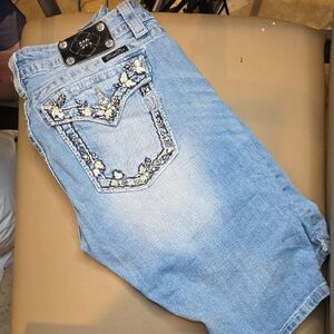 Miss Me Light Blue Boot Cut Jeans with Embroidered Floral Back Pocket